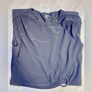 Black croped Express top with shoulder pads.